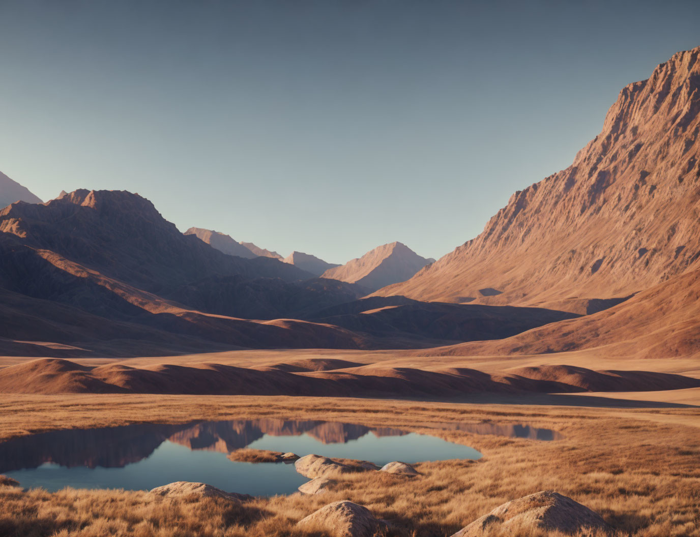 Tranquil mountain landscape with reflective lake at dusk