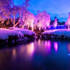 Twilight lakeside scene with purple hues, city lights, skyscrapers, and palm trees