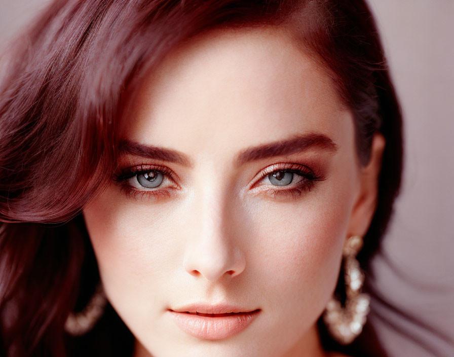 Close-up Portrait of Woman with Deep Blue Eyes and Dark Hair