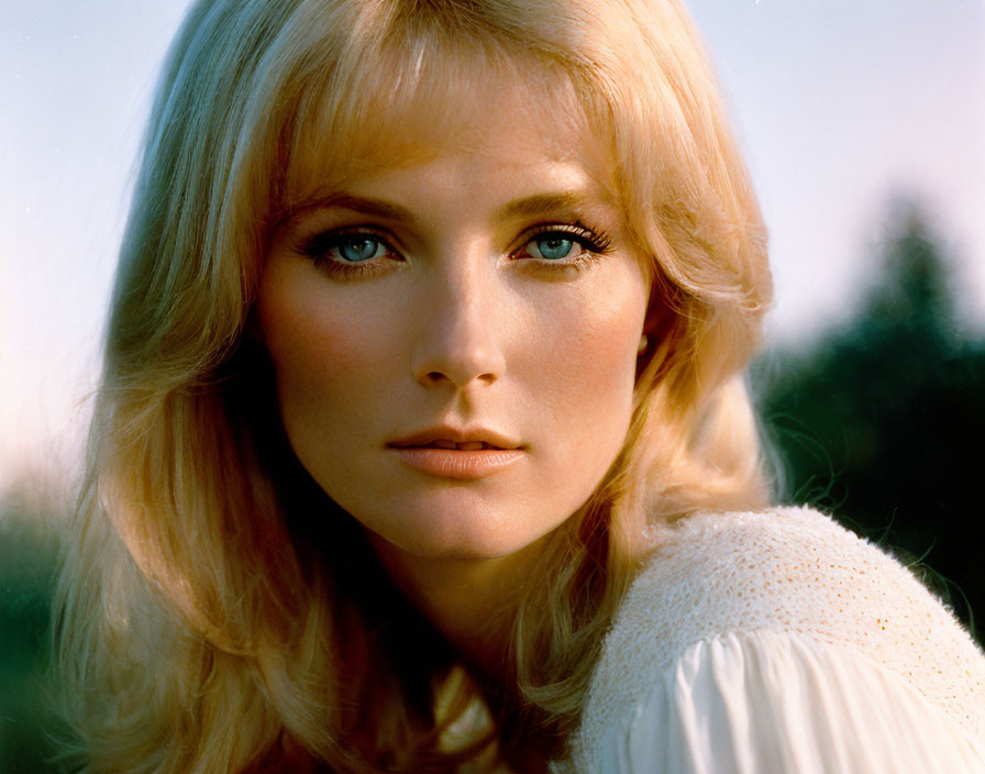 Blonde Woman Portrait with Blue Eyes and Fair Skin in Golden Hour