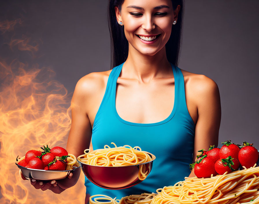 Smiling woman with flaming spaghetti and tomato bowl