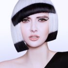 Digital Art Portrait: Female with Stylized Black-and-White Bob Haircut and Blue-Black