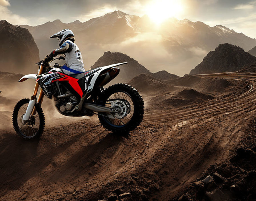 Motocross rider mid-jump with mountain backdrop and cloudy sky.