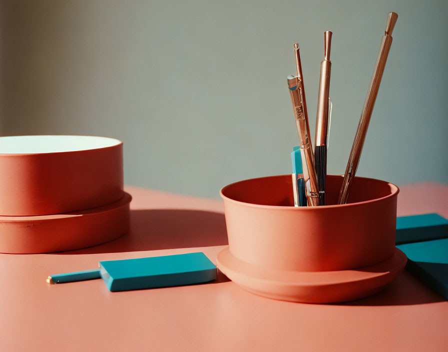 Terracotta Round Organizers with Pens, Brushes, and Blue Highlighter