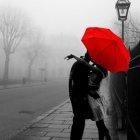 Romantic couple under red umbrella in rainy street with glowing lamps