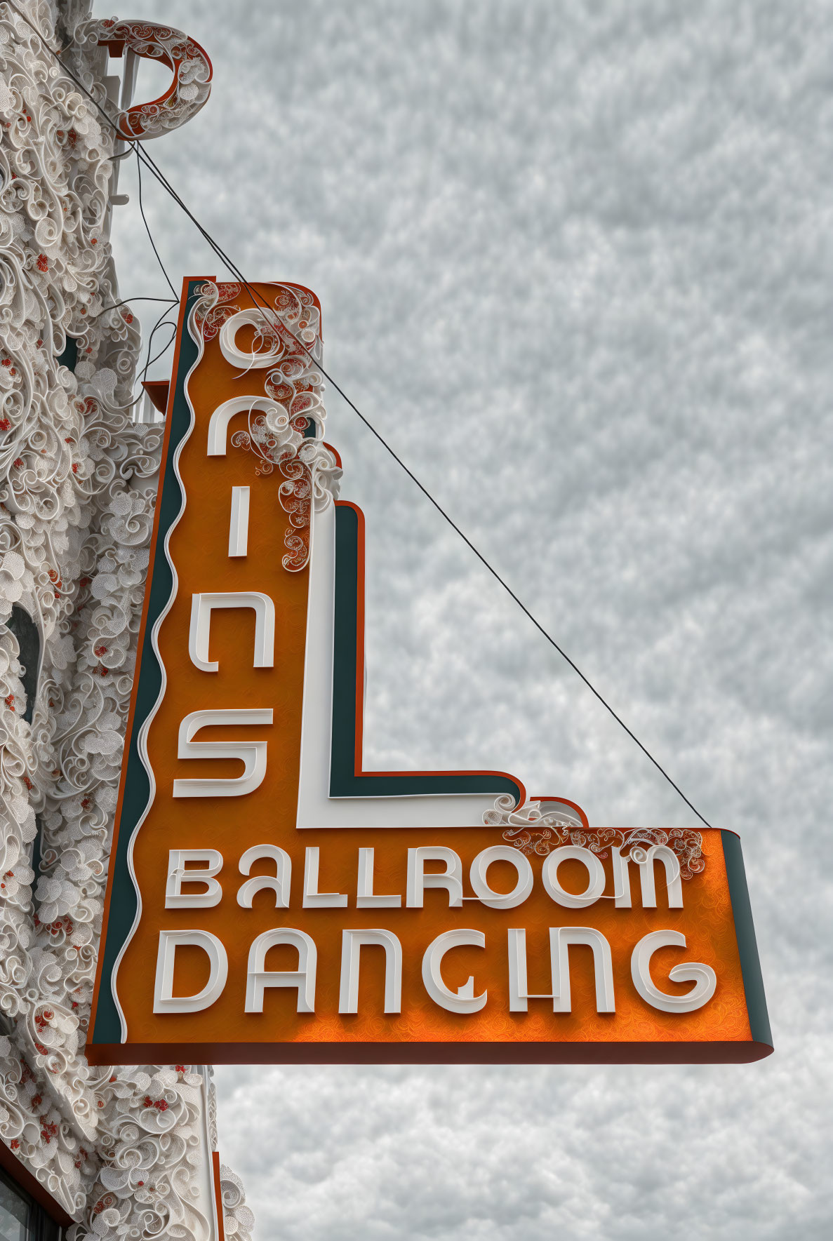 Bright Neon Sign: "Ballroom Dancing" on Cloudy Sky