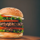 Classic Double Cheeseburger with Lettuce, Tomatoes & Sauce on Sesame Seed Bun