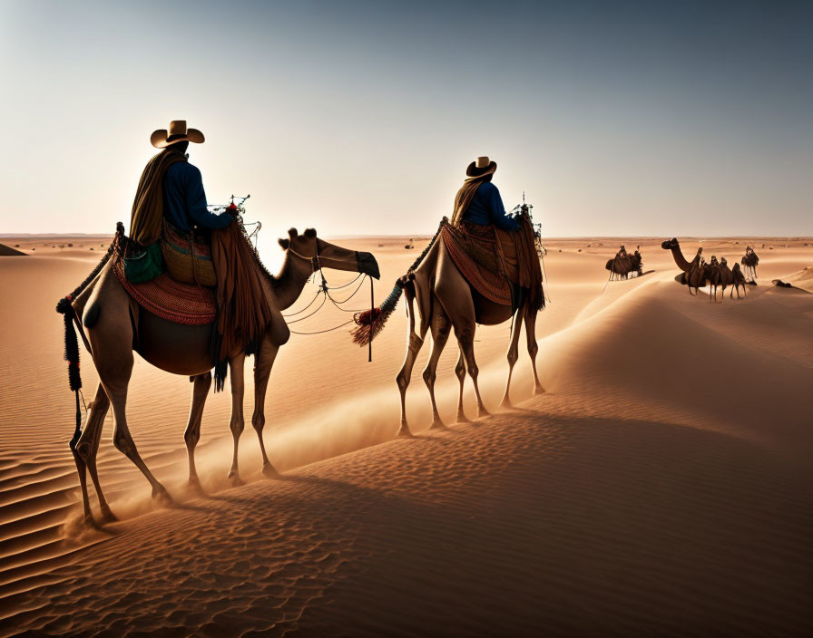 Desert landscape: Two people on camels with caravan in background