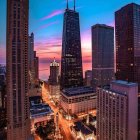 Cityscape at Dusk: Illuminated Buildings and Busy Street in Warm Sunset Glow