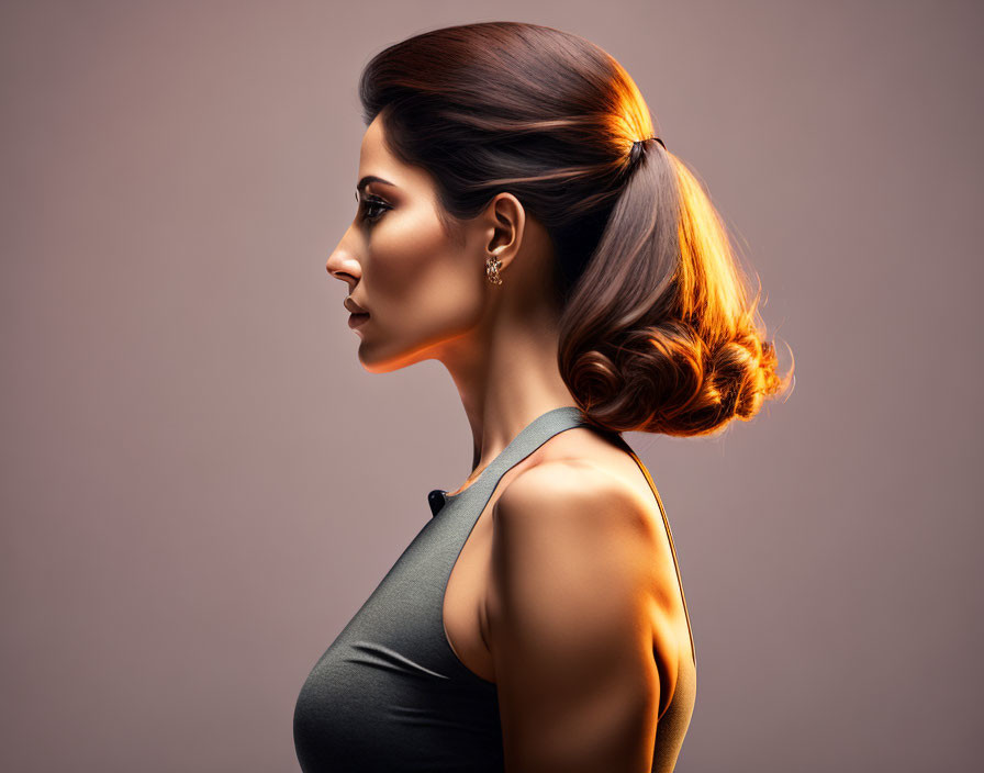 Woman with Elegant Hairstyle and Makeup in Olive Top