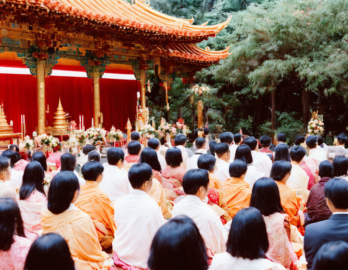 Traditional Temple Gathering with Colorful Attire and Ornate Altar