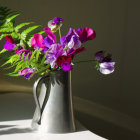 Purple Pansies and Green Ferns in Metallic Teapot Display