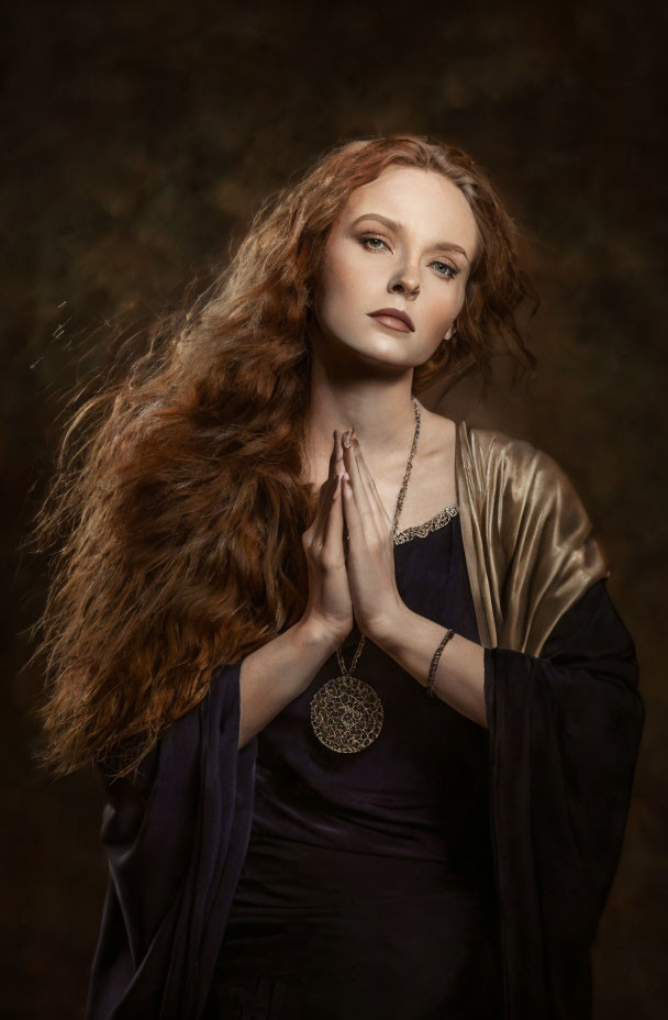 Red-haired woman in vintage dress with elegant pose