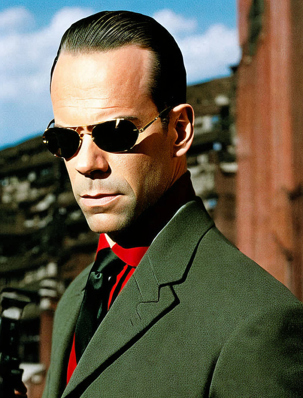 Confident man in suit and sunglasses outdoors with serious expression