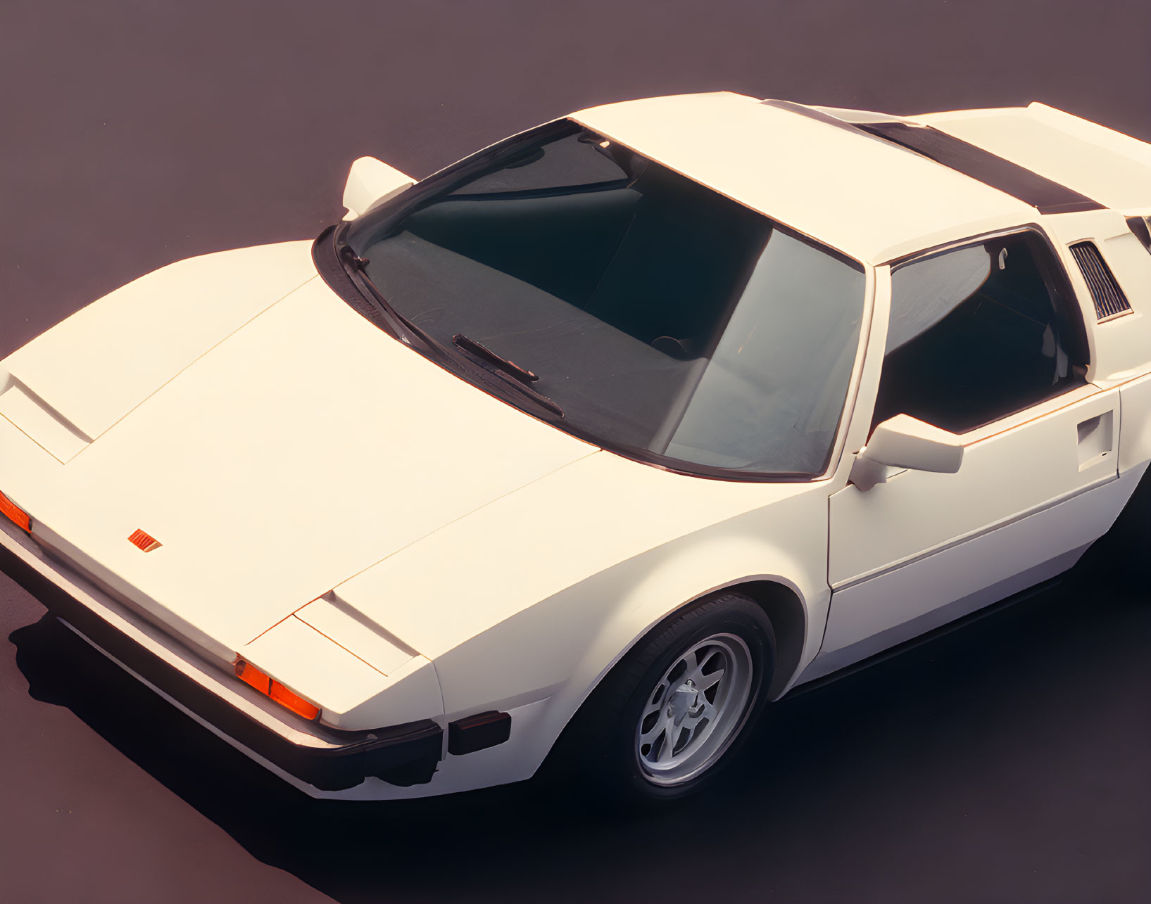 Classic White Sports Car with Pop-Up Headlights and Sunroof