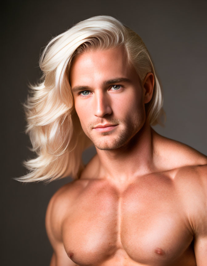 Blond man with beard and intense gaze portrait.