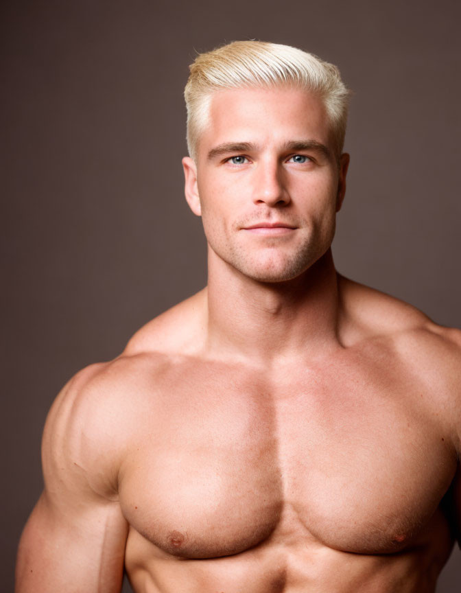 Muscular Blond Man Portrait on Brown Background