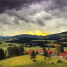 Scenic village landscape with rolling hills, livestock, and dramatic sunset sky