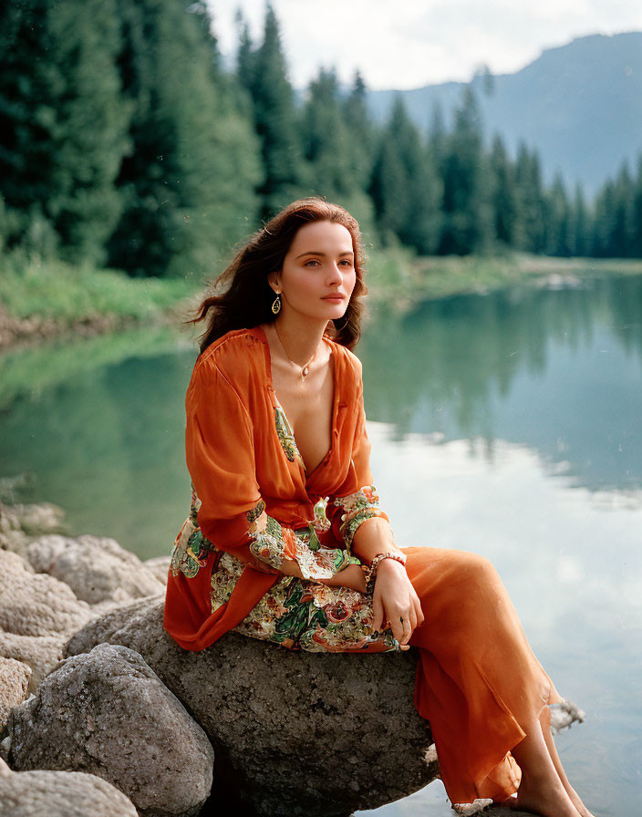 Woman in Orange Dress by Tranquil Mountain Lake