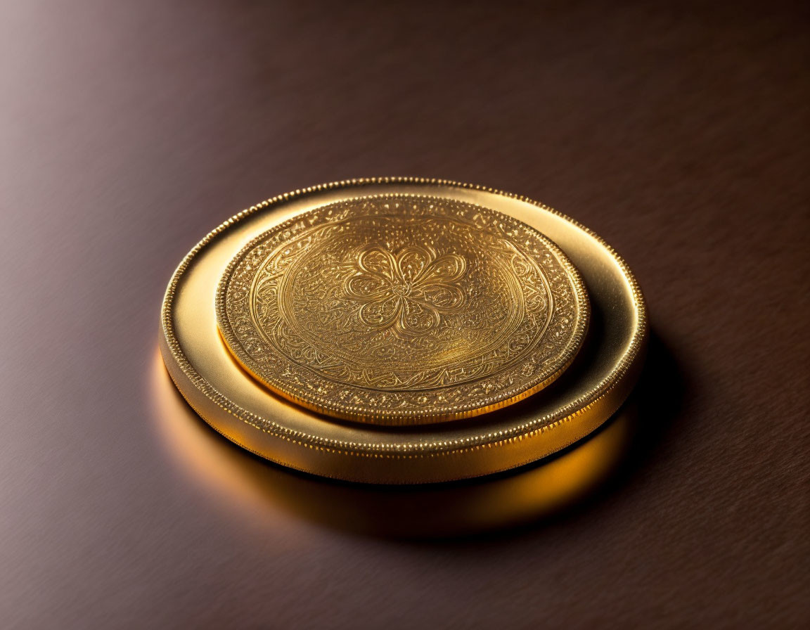 Detailed Golden Coin on Reflective Surface with Embossed Design