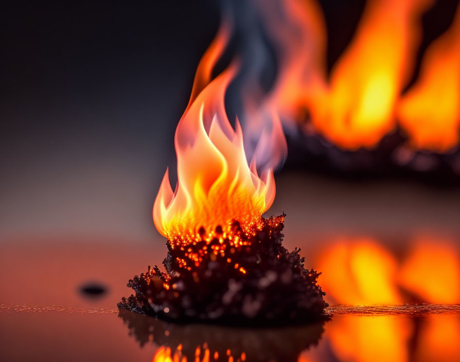 Close-Up of Vibrant Flame Consuming Dark Substance