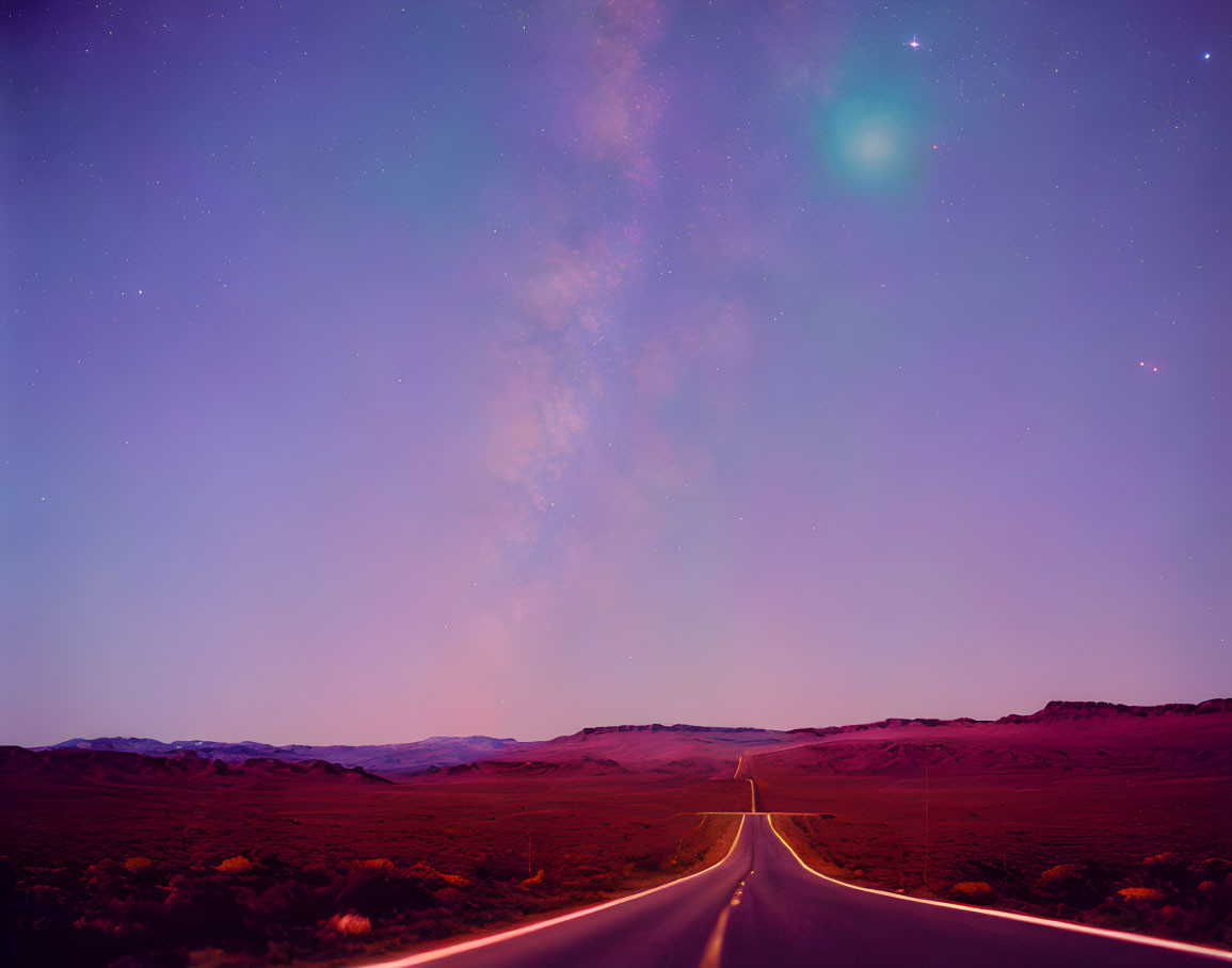 Desert landscape with road under vibrant Milky Way