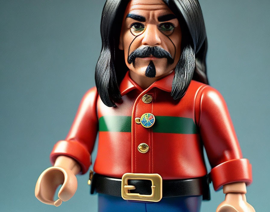 Stylized figurine of a man with a mustache in red jacket