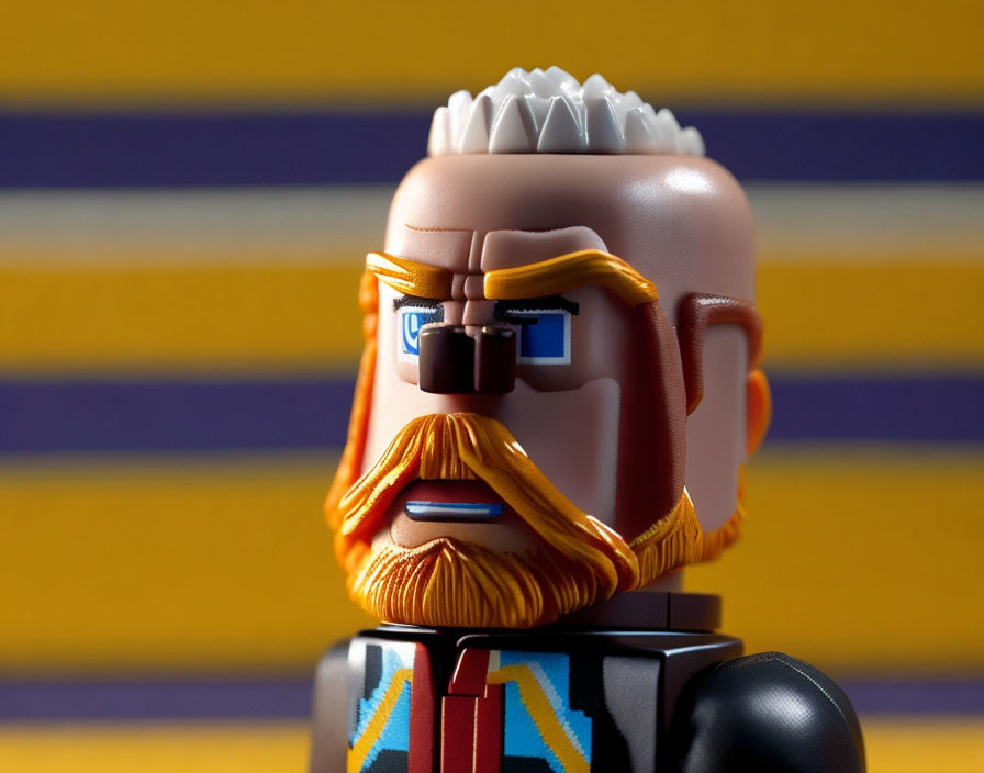 Ginger bearded Lego figurine in glasses on colorful background