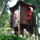 Elaborate multi-story treehouse in lush forest