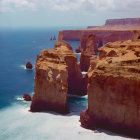 Layered Rock Formations on Rugged Coastal Cliffs