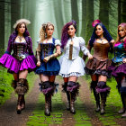 Five Women in Elaborate Steampunk Attire Standing in Forest