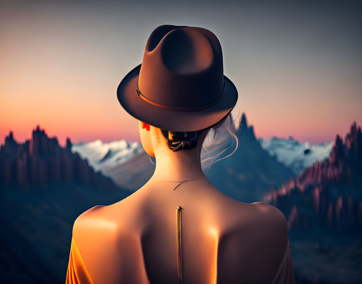 Woman in hat admires sunset over mountains, showcasing back with zipper dress.