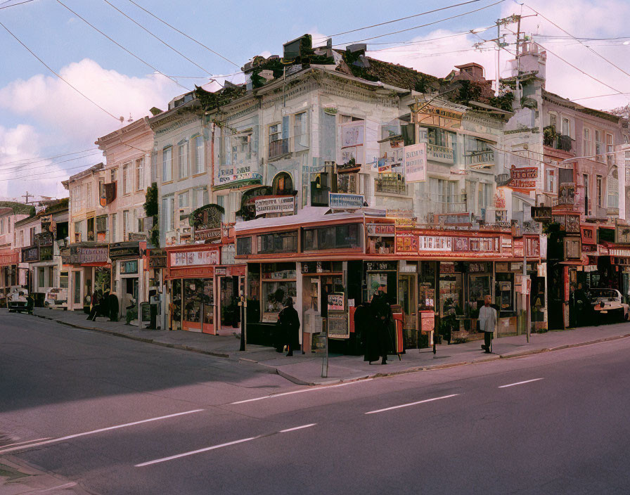 Historic street scene with pedestrians and old storefronts under cloudy sky