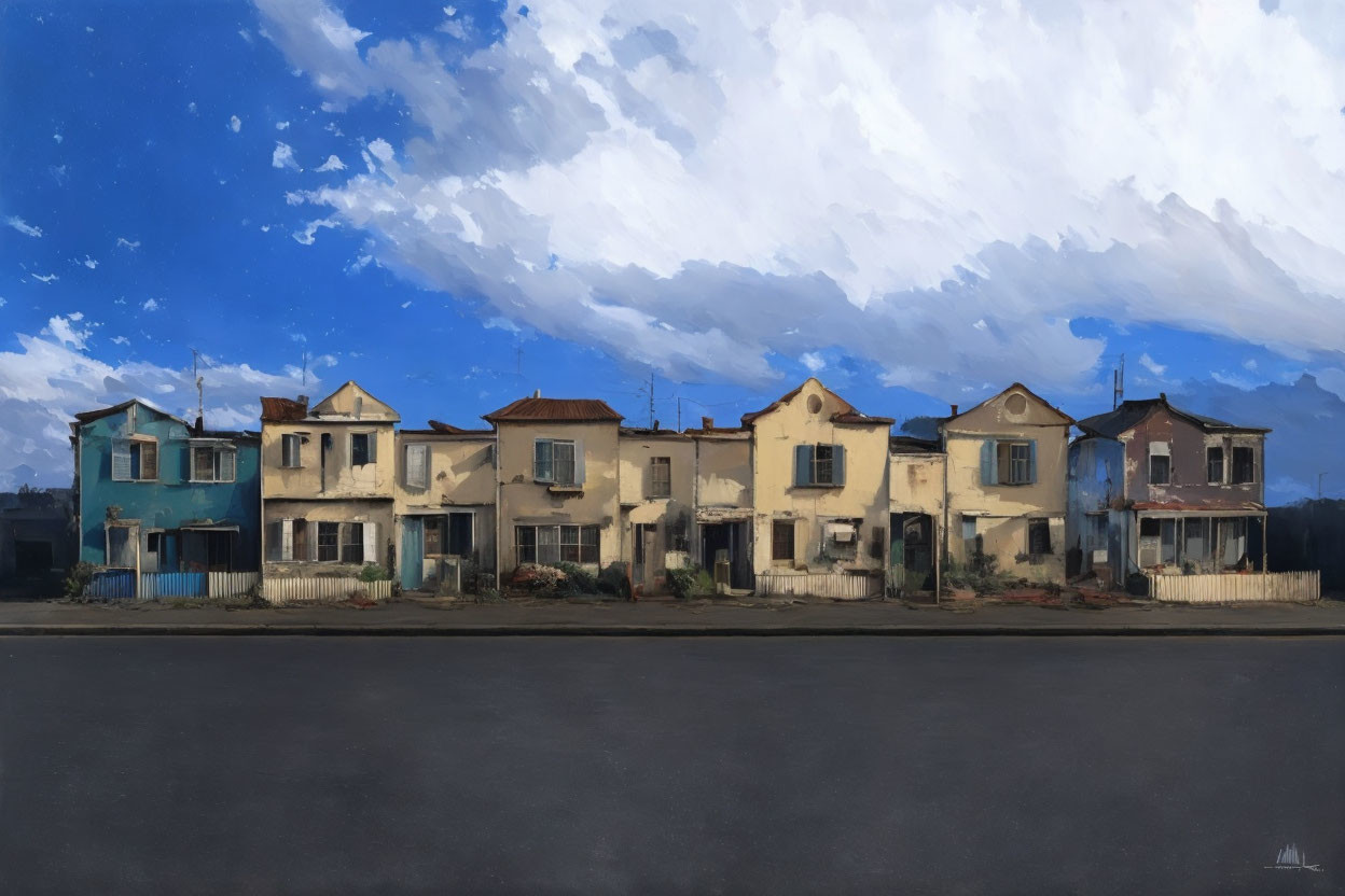 Quaint old-fashioned houses under dynamic blue sky and wispy clouds