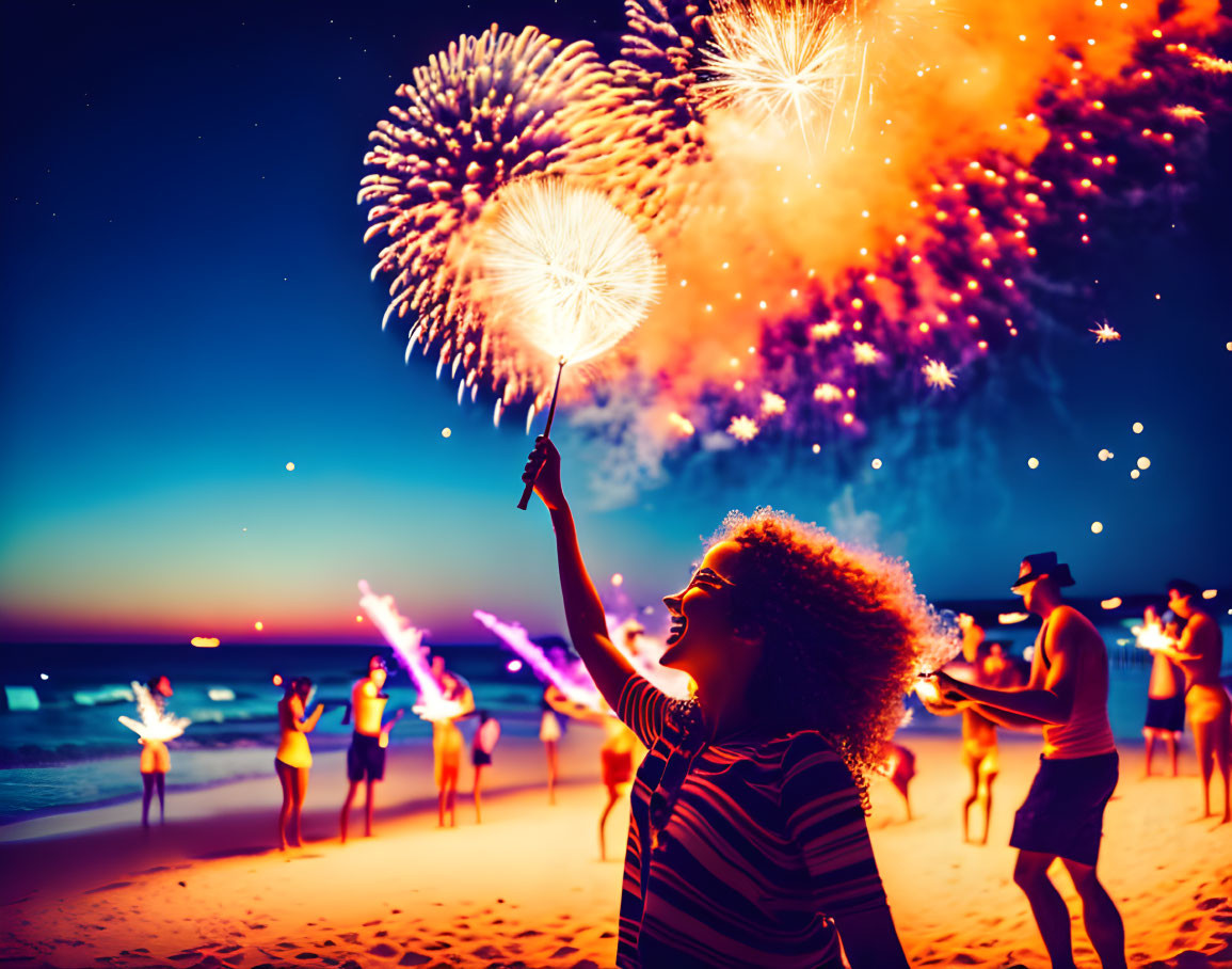 Nighttime beach scene with sparkler, fireworks, and silhouettes.