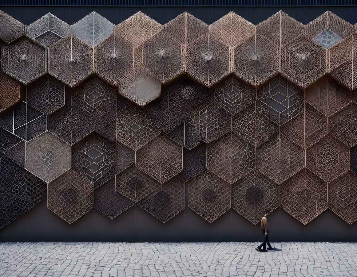 Solitary Figure Walking by Large Geometric Honeycomb Wall