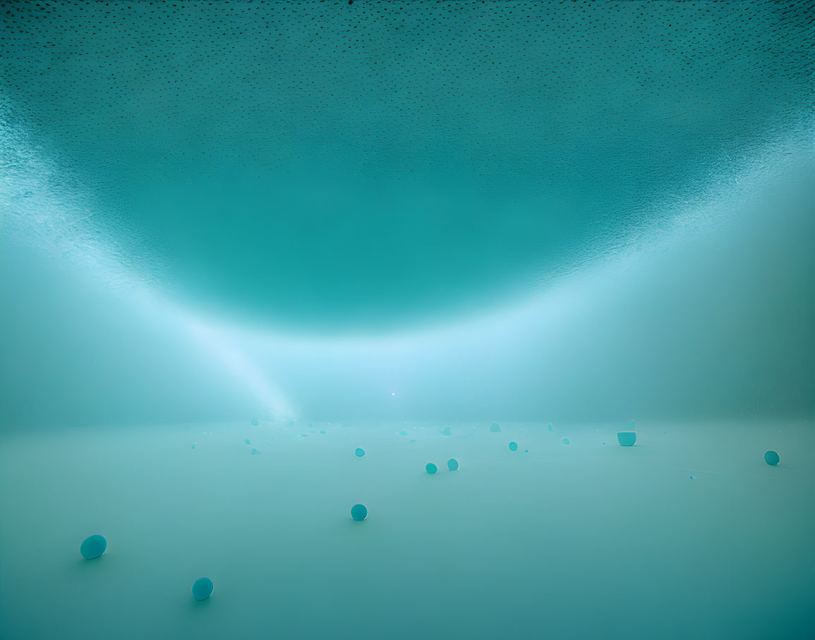 Sunbeams penetrate underwater, creating blue gradient with small fish.