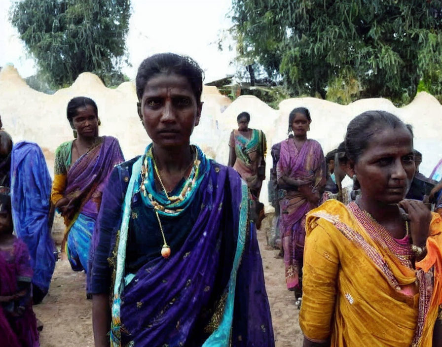 Women in Colorful Traditional Dresses Outdoors