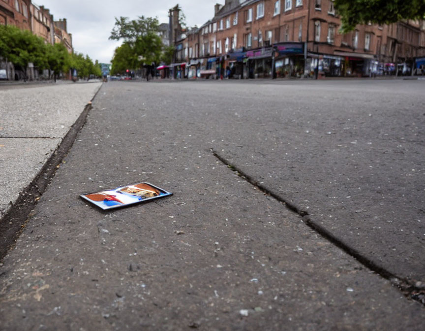 Deserted urban street photo album with cloudy sky