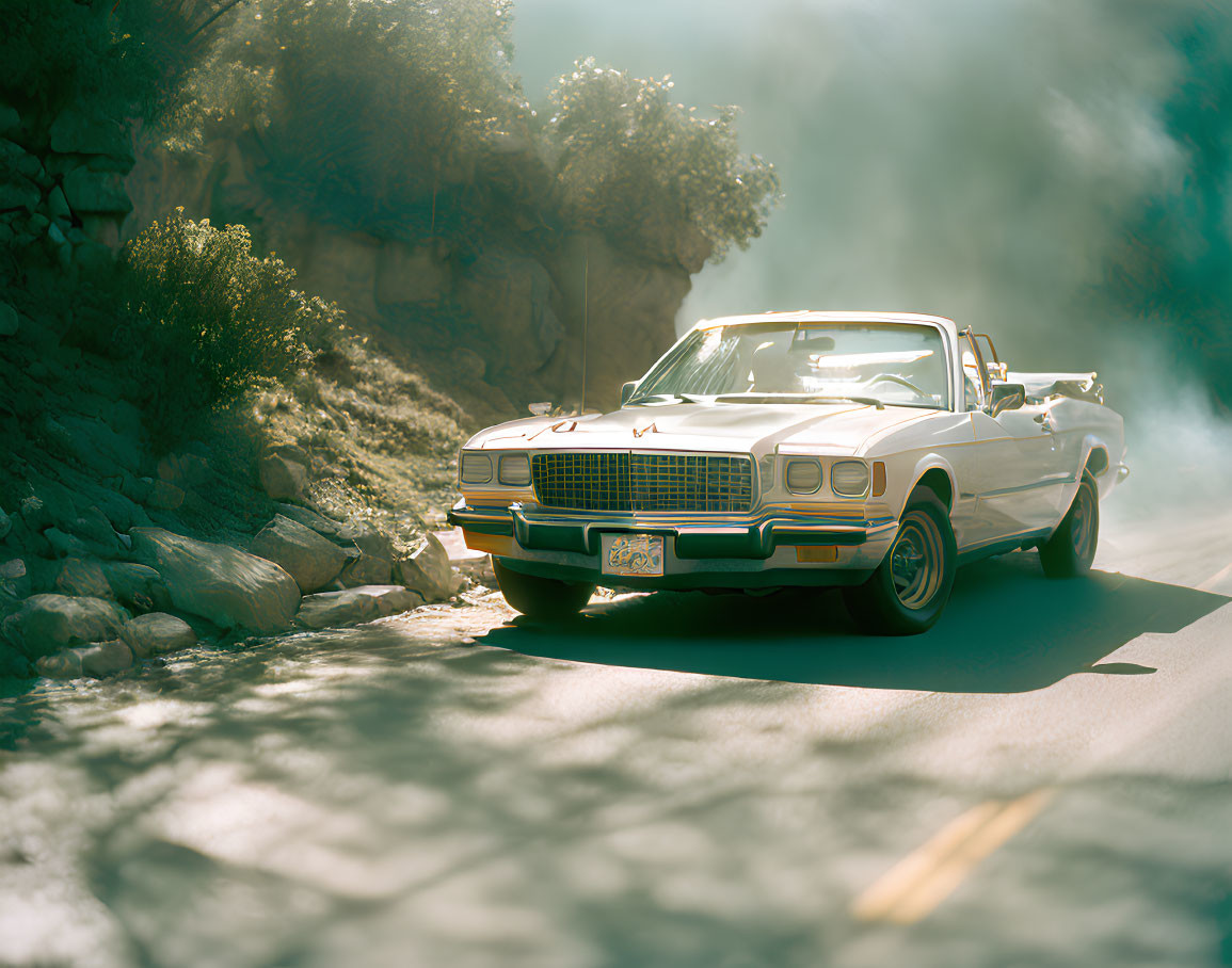 Classic White Convertible Car Driving on Sunlit Mountain Road