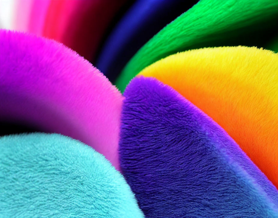 Close-up of Multicolored Fuzzy Textures in Swirling Rainbow Pattern