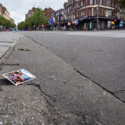 Deserted urban street photo album with cloudy sky