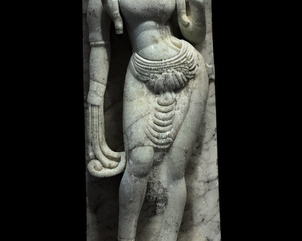 Ancient stone sculpture of female figure in contrapposto pose