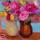 Colorful Flowers in Red Vase on Decorated Table Against Blue Background