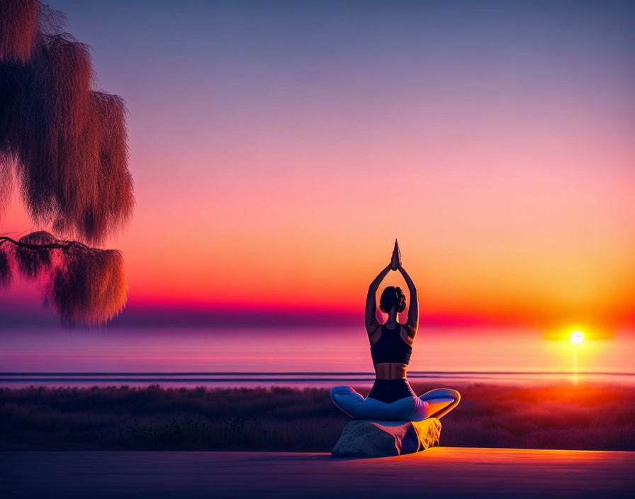 Person practicing yoga at sunset with vibrant purple and orange skies