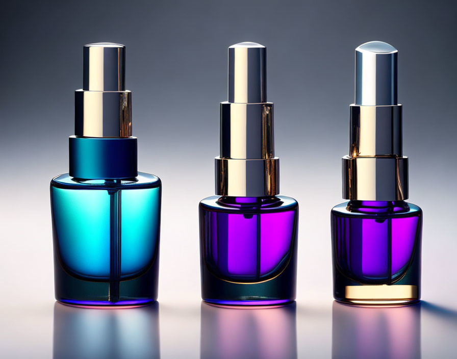 Gradient-colored cosmetic bottles with metallic caps on blue and purple background