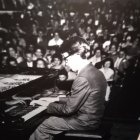 Dimly Lit Jazz Band Performance with Pianist and Horn Players