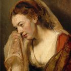 Vibrant portrait of pensive woman with wavy hair resting cheek on hand