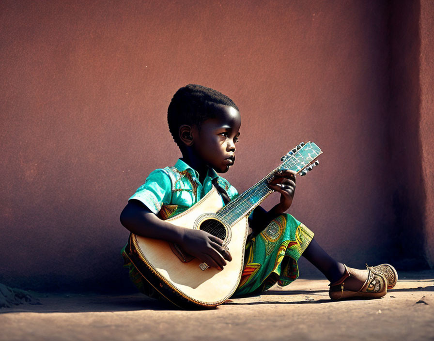 Child playing acoustic guitar in colorful attire against warm-toned wall