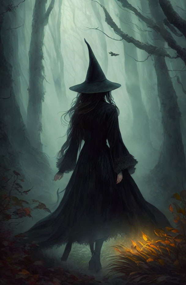 Mysterious figure in black cloak in misty autumn forest